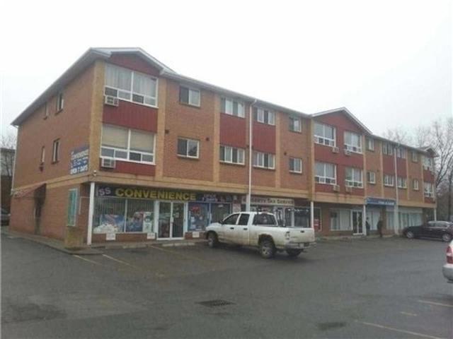 837 Simcoe St S, Unit 302 photo #1