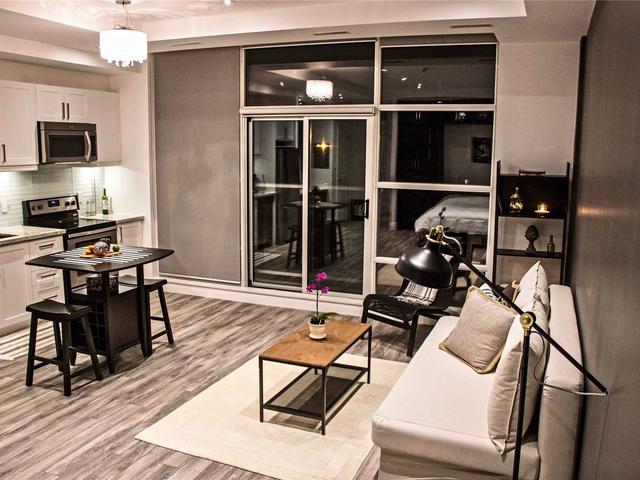 302 - 1003 Queen St E