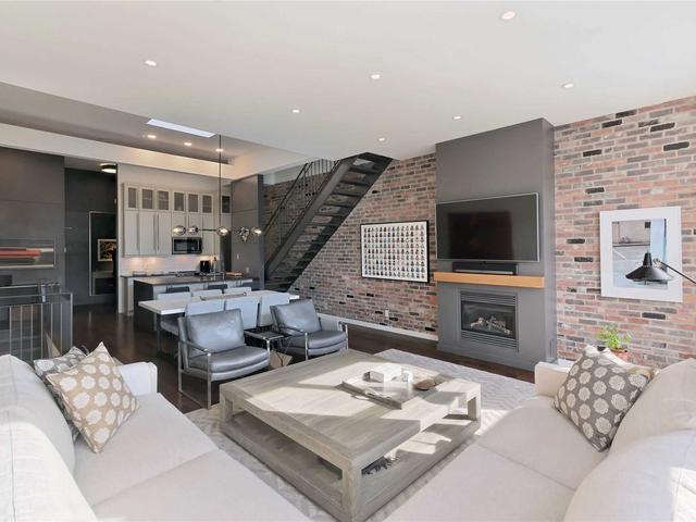 303 - 1842 Queen St E