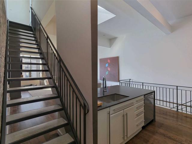 303 - 1842 Queen St E