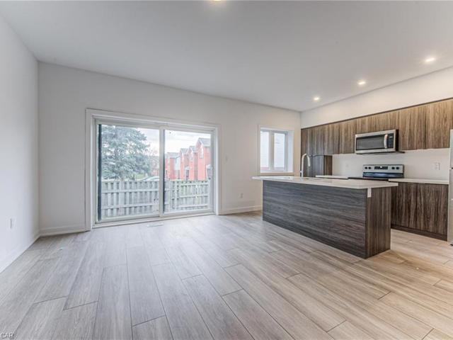 15 - 416 Dundas Street S