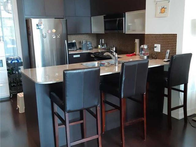 202 - 380 Macpherson Ave