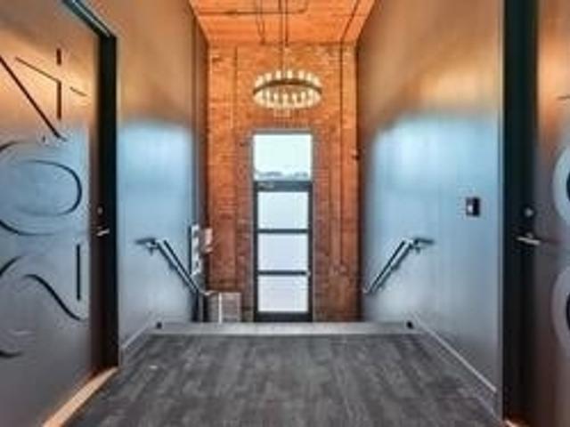 201 - 736 Dundas St E