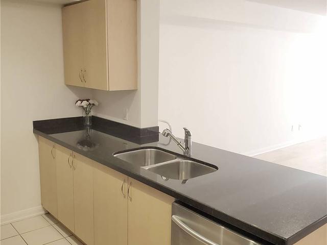 210 - 18 Beverley St