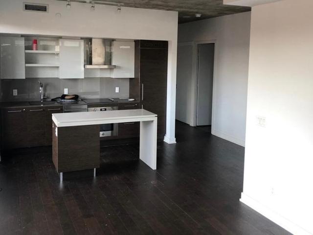 703 - 1030 King St W