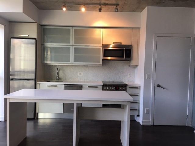 203 - 1205 Queen St W