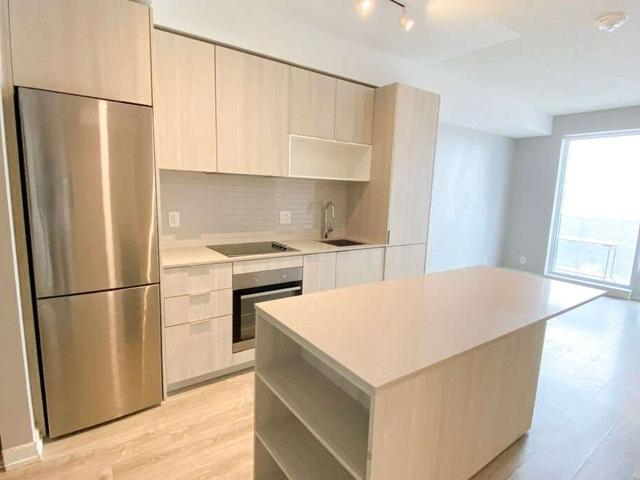 1906 - 20 Tubman Ave