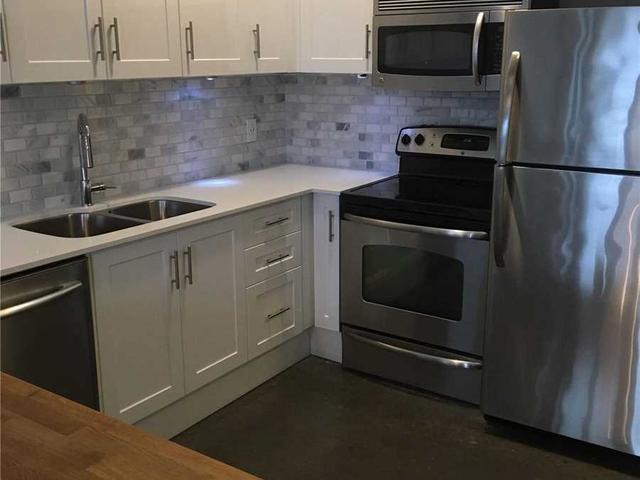 208 - 625 Queen St E