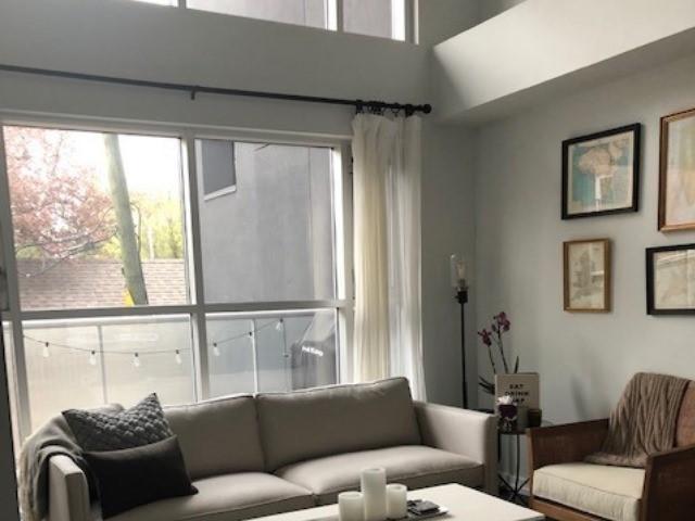 202 - 1852 Queen St E