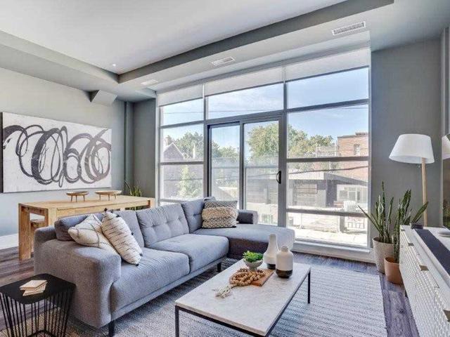 202 - 1003 Queen St E