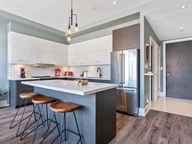 202 - 1003 Queen St E