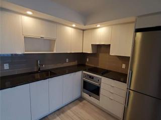 705 - 225 Village Green Sq