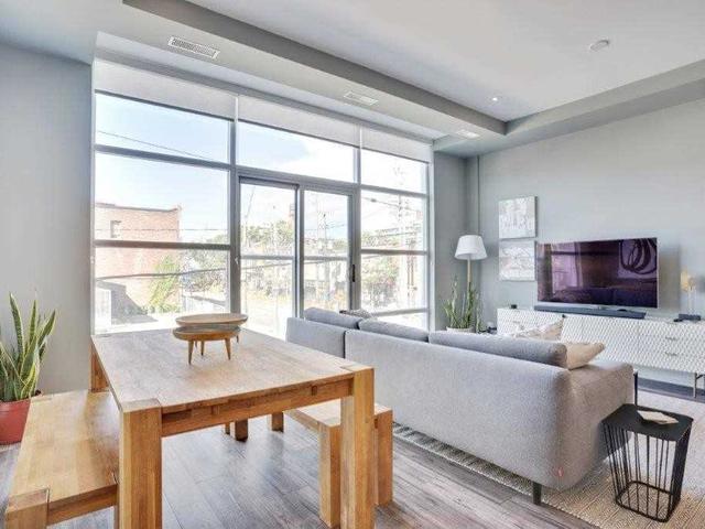 202 - 1003 Queen St E