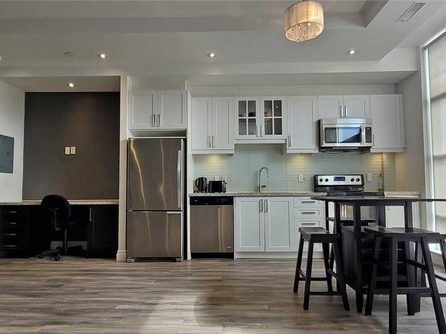 302 - 1003 Queen St E