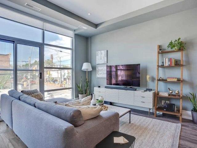 202 - 1003 Queen St E