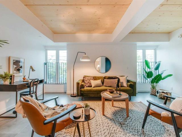 302 - 1598 Queen St E