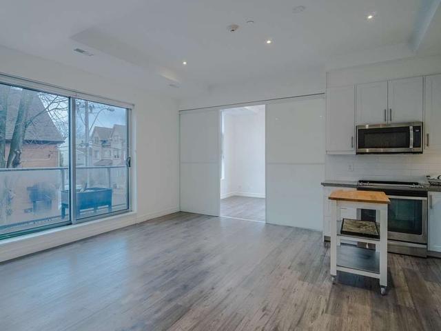 203 - 1003 Queen St E