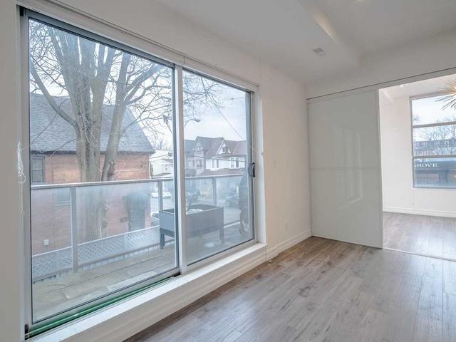 203 - 1003 Queen St E