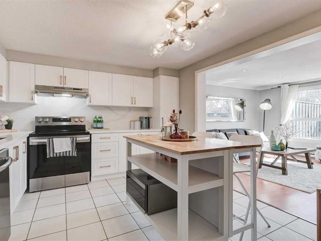 104 - 850 Huntingwood Dr