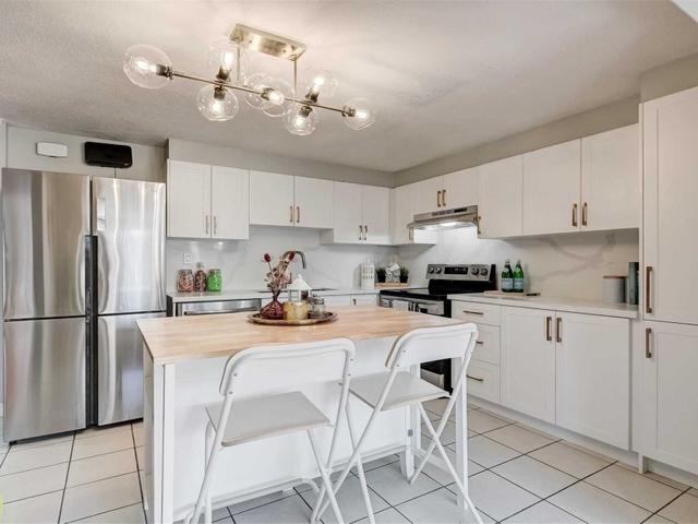 104 - 850 Huntingwood Dr