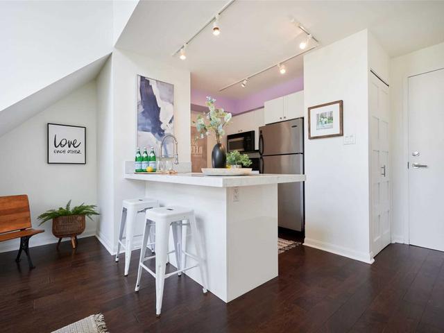 205 - 2012 Queen St E