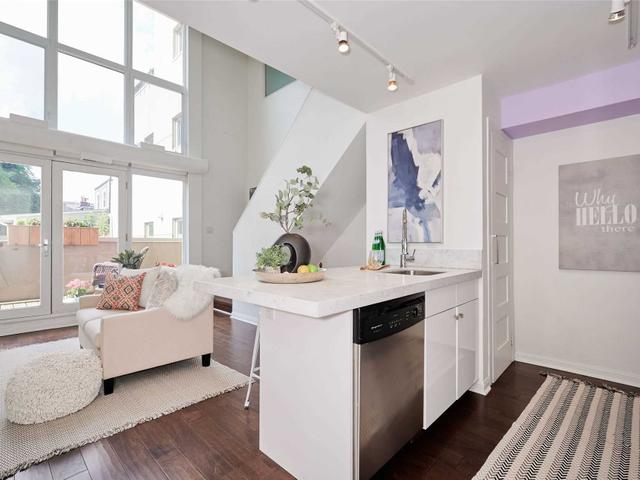 205 - 2012 Queen St E