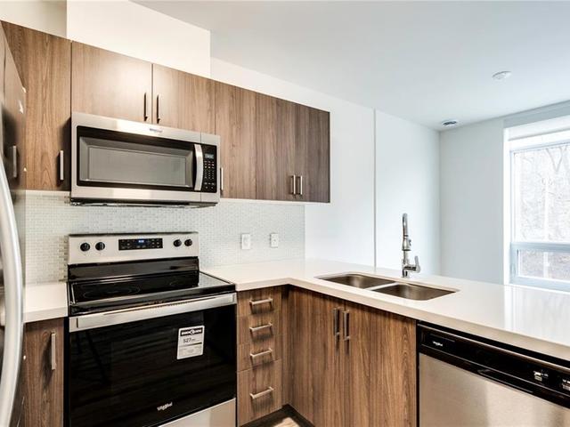 202 - 455 Charlton Avenue E