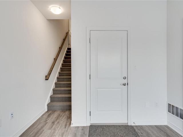 105 - 575 Woodward Avenue