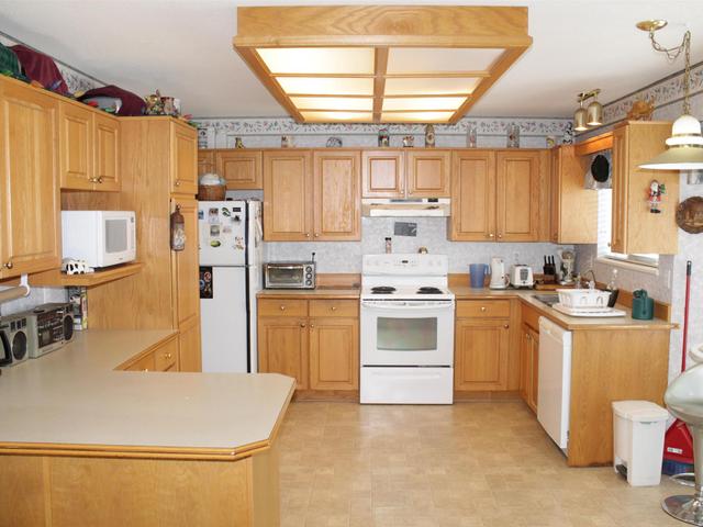 212 - 6875 121 STREET