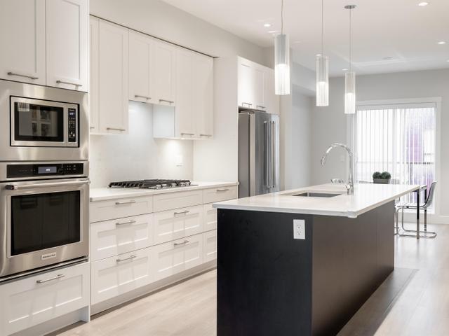 57 - 16336 23A AVENUE