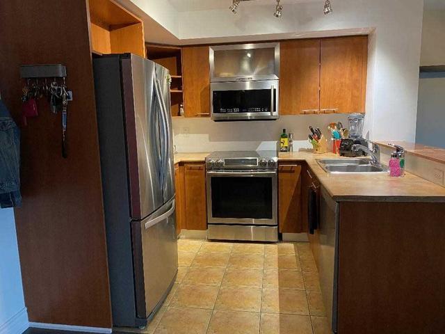 106 - 1040 The Queensway Ave