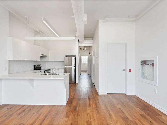 3 3rd F - 1249 Queen St W