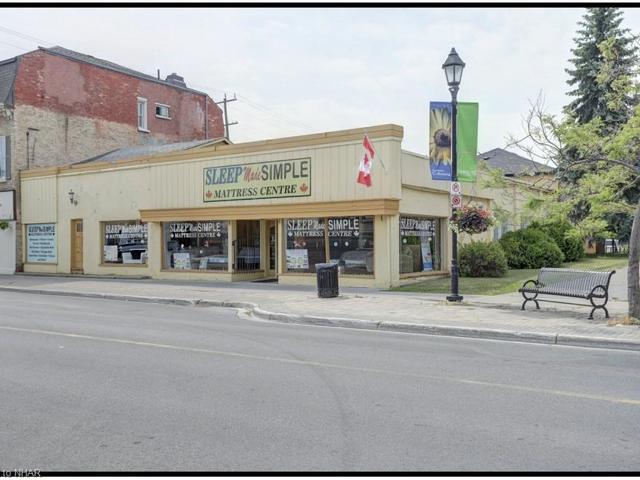 125-127-129 King St W