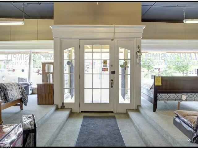 125-127-129 King St W